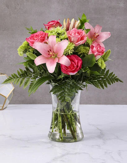Blushing Beauty – Pink Lilies & Cerise Roses in a Vase